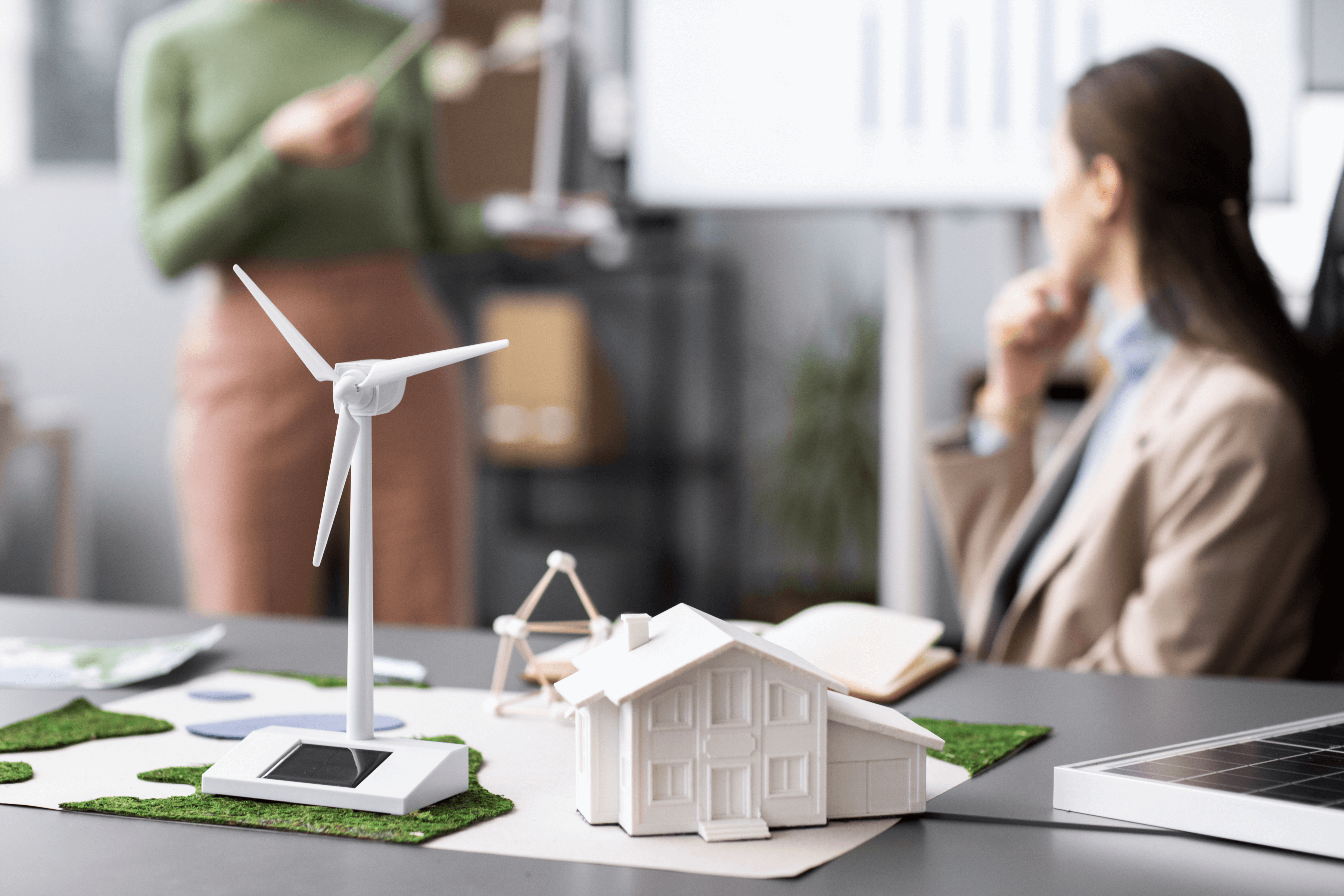 Image of model of wind turbine on a desk in an office